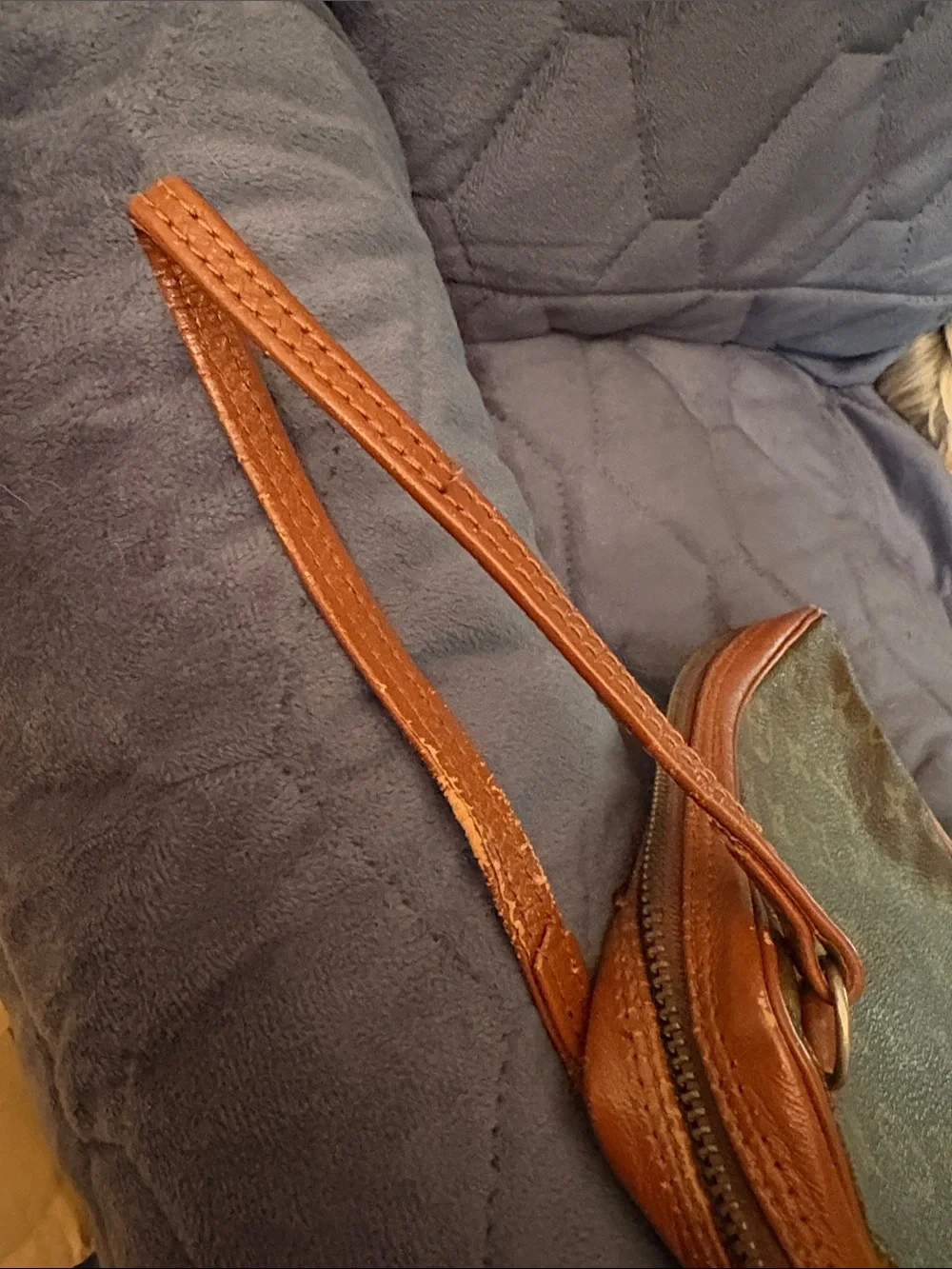 Louis Vuitton Brown Leather Monogram cosmetic case with wristlet strap.